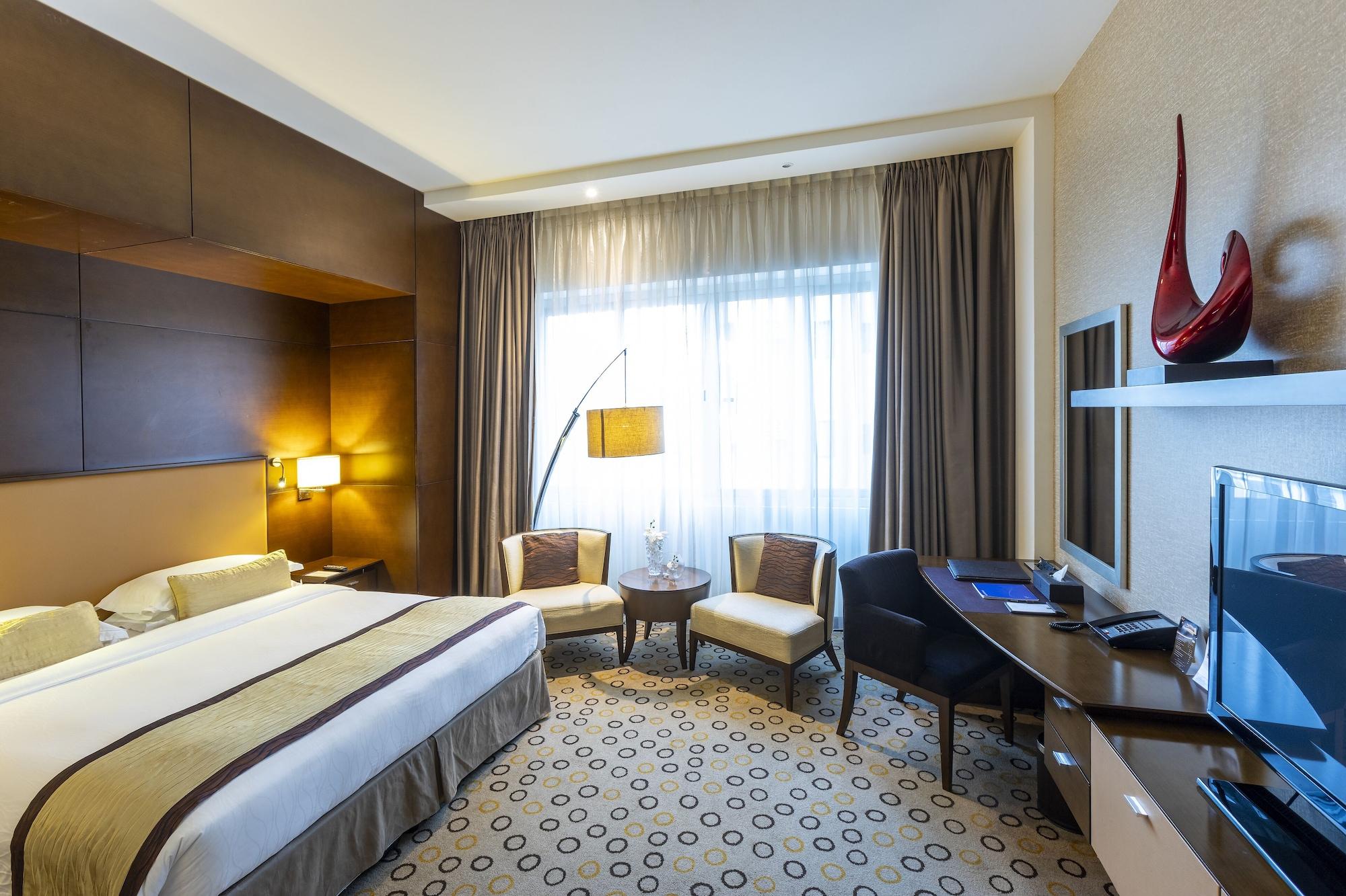 Asiana Hotel Dubai Exterior photo A room at the hotel