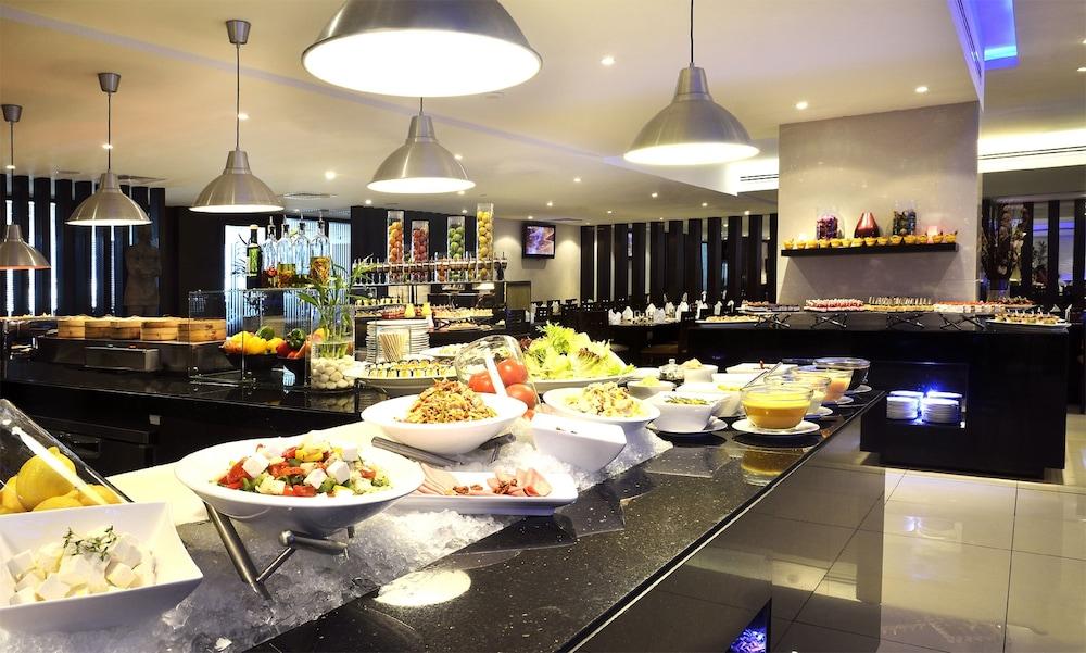 Asiana Hotel Dubai Exterior photo A buffet at a hotel