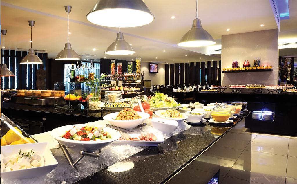 Asiana Hotel Dubai Exterior photo A buffet at a hotel